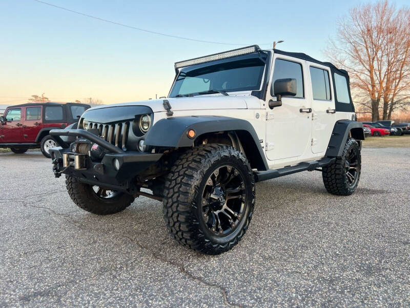 2015 Jeep Wrangler Unlimited for sale at Carworx LLC in Dunn NC