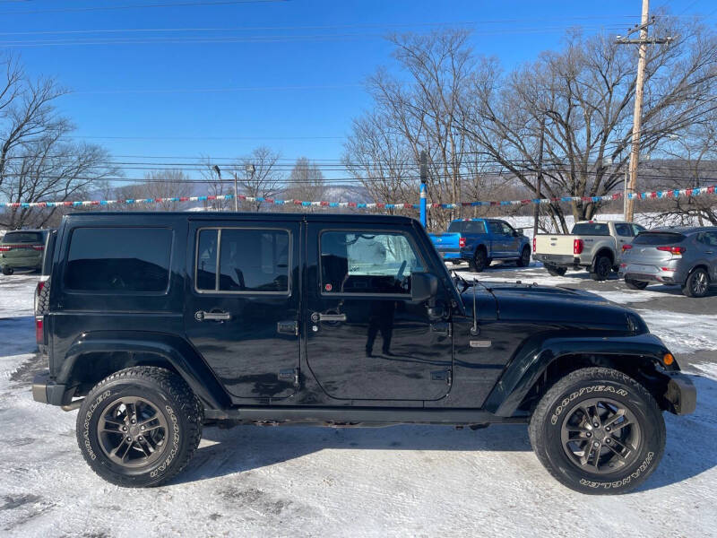 2016 Jeep Wrangler Unlimited for sale at MAGNUM MOTORS in Reedsville PA