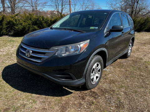2013 Honda CR-V for sale at PUTNAM AUTO SALES INC in Marietta OH