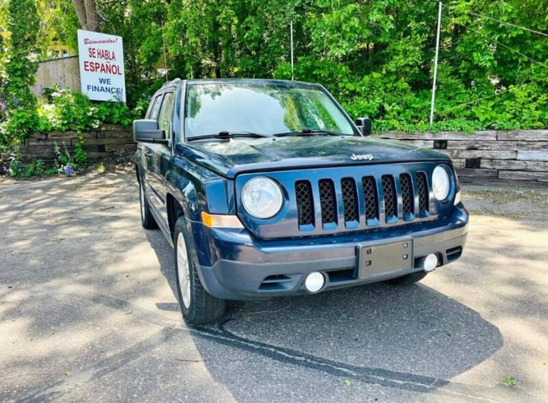 2014 Jeep Patriot for sale at Rams Auto Sales LLC in South Saint Paul MN