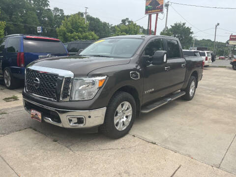 2017 Nissan Titan for sale at Azteca Auto Sales LLC in Des Moines IA