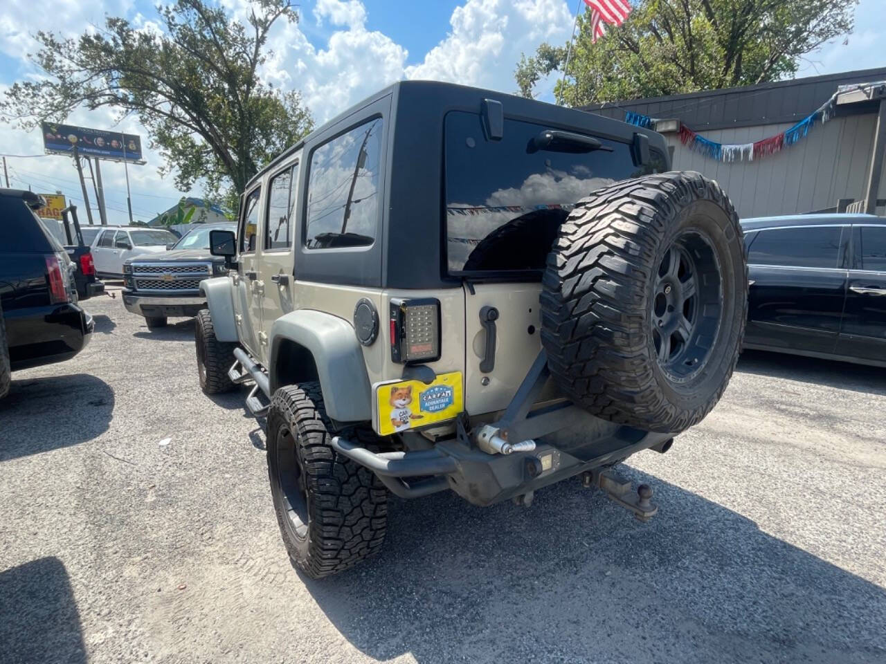 2011 Jeep Wrangler Unlimited for sale at DIAMOND MOTORS INC in Houston, TX