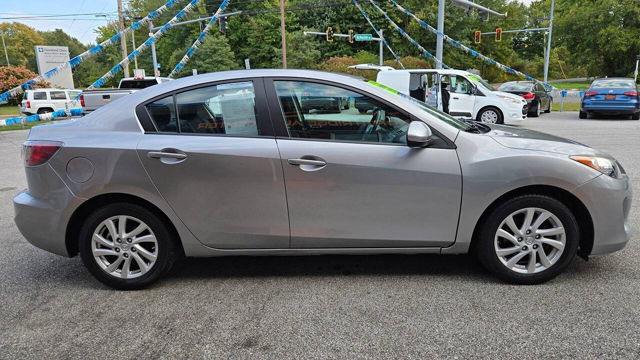 2012 Mazda Mazda3 for sale at North Ridge Auto Center LLC in Madison, OH