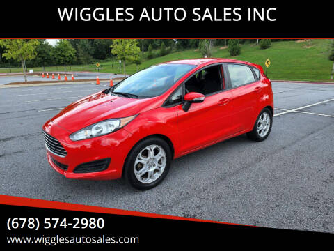 2015 Ford Fiesta for sale at WIGGLES AUTO SALES INC in Mableton GA
