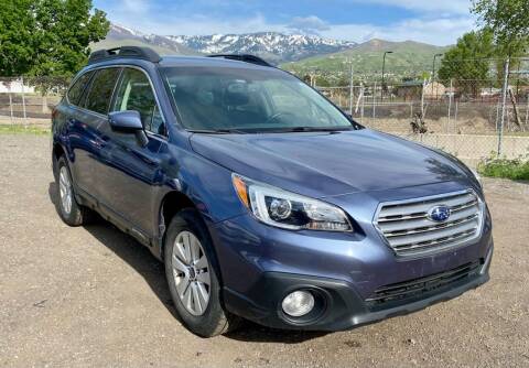 2015 Subaru Outback for sale at The Car-Mart in Bountiful UT