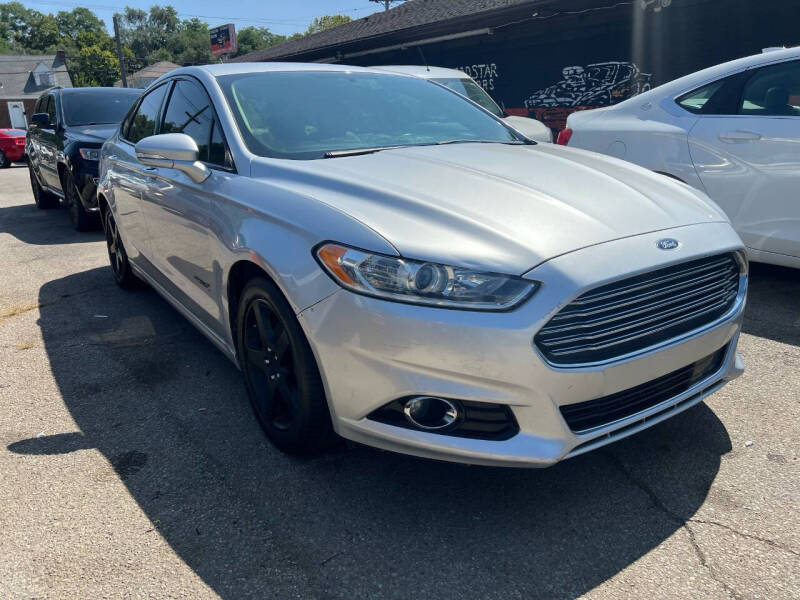 2014 Ford Fusion Hybrid for sale at ROADSTAR MOTORS in Liberty Township OH