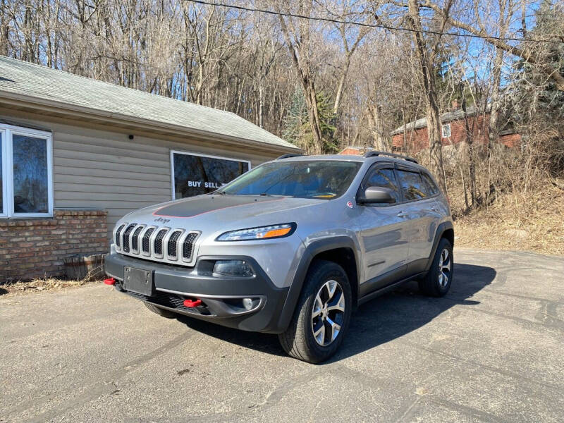 2016 Jeep Cherokee for sale at Rams Auto Sales LLC in South Saint Paul MN