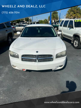 2010 Dodge Charger for sale at WHEELZ AND DEALZ, LLC in Fort Pierce FL