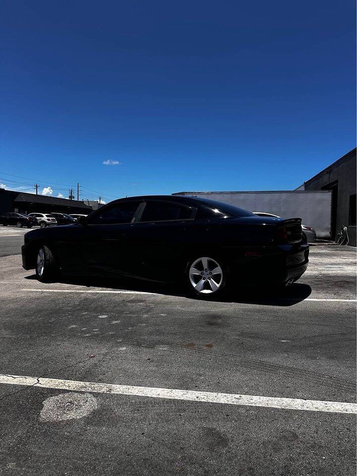 2012 Dodge Charger for sale at ALPHA AUTOMOTIVE SALES in Oakland Park, FL