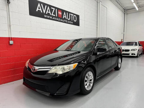 2012 Toyota Camry for sale at AVAZI AUTO GROUP LLC in Gaithersburg MD