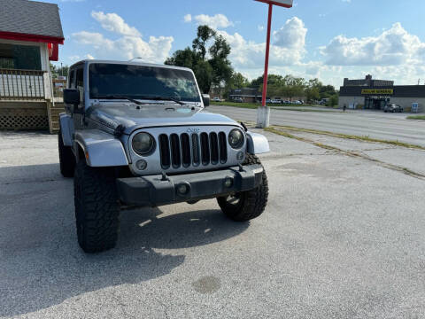 2015 Jeep Wrangler Unlimited for sale at Unique Motors in Rock Island IL