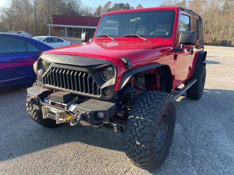 2007 Jeep Wrangler Unlimited for sale at Certified Motors LLC in Mableton GA