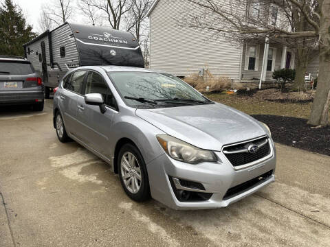 2015 Subaru Impreza for sale at JE Autoworks LLC in Willoughby OH