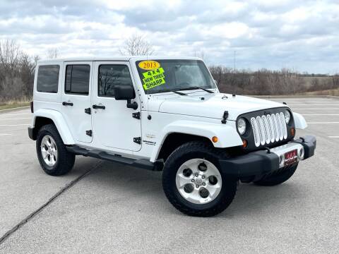 2013 Jeep Wrangler Unlimited for sale at A & S Auto and Truck Sales in Platte City MO