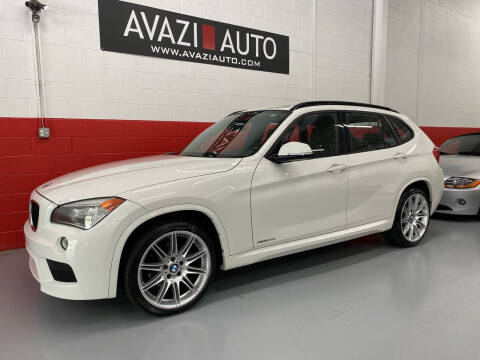 2013 BMW X1 for sale at AVAZI AUTO GROUP LLC in Gaithersburg MD