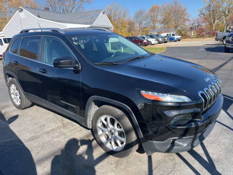 2014 Jeep Cherokee for sale at HEDGES USED CARS in Carleton MI