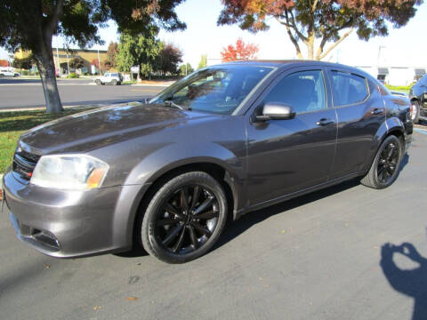 2014 Dodge Avenger for sale at KM MOTOR CARS in Modesto CA