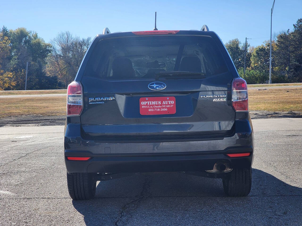 2015 Subaru Forester for sale at Optimus Auto in Omaha, NE