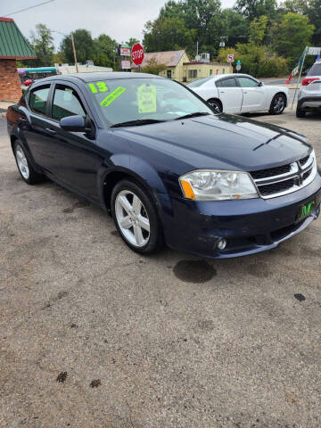 2013 Dodge Avenger for sale at Johnny's Motor Cars in Toledo OH