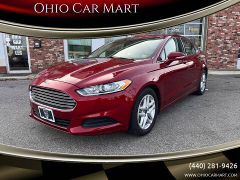 2015 Ford Fusion for sale at Ohio Car Mart in Elyria OH