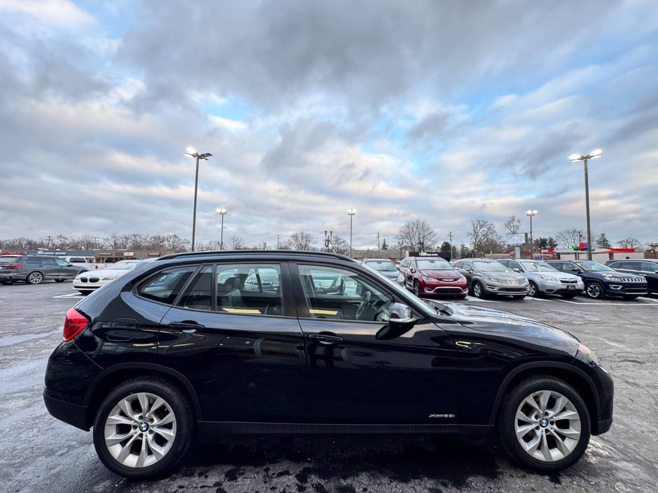 2013 BMW X1 for sale at Opus Motorcars in Utica, MI