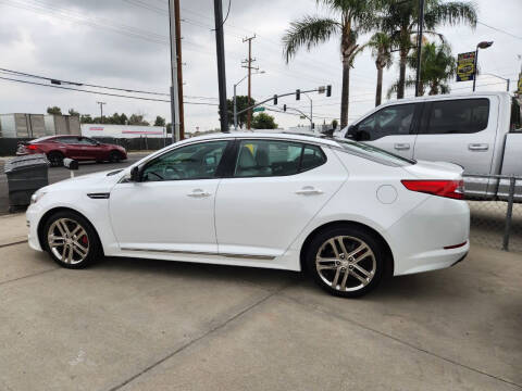 2013 Kia Optima for sale at E and M Auto Sales in Bloomington CA