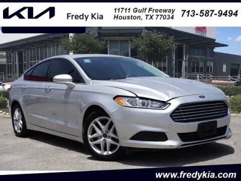 2016 Ford Fusion for sale at FREDY KIA USED CARS in Houston TX