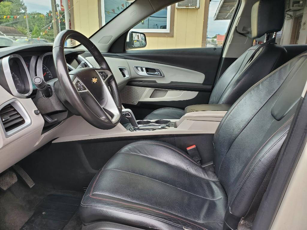 2014 Chevrolet Equinox for sale at DAGO'S AUTO SALES LLC in Dalton, GA