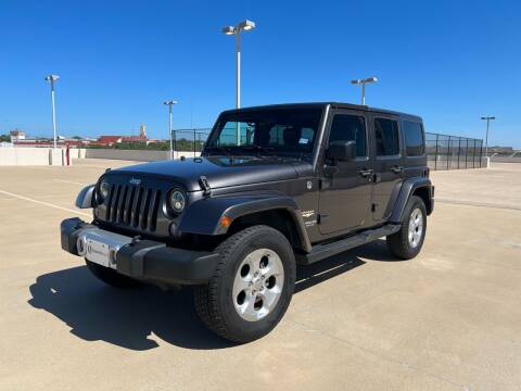 2014 Jeep Wrangler Unlimited for sale at Signature Autos in Austin TX