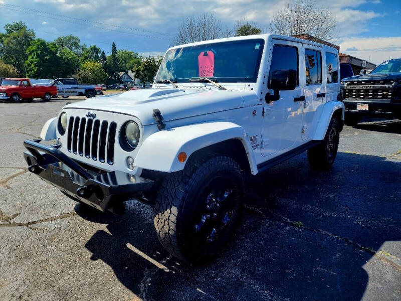 Used 2015 Jeep Wrangler Unlimited Altitude with VIN 1C4BJWEG4FL757389 for sale in Adams, WI