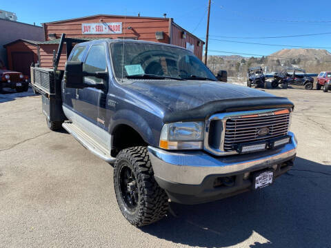 2004 Ford F-350 Super Duty for sale at BERKENKOTTER MOTORS in Brighton CO