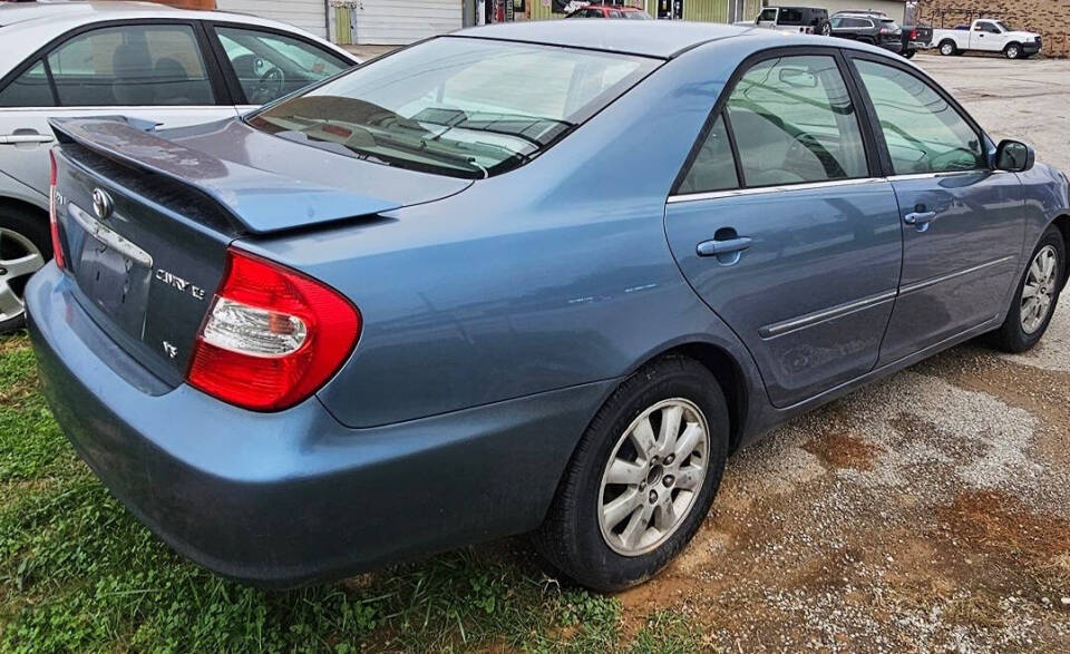 2003 Toyota Camry for sale at Art's Used Cars in Winfield, WV