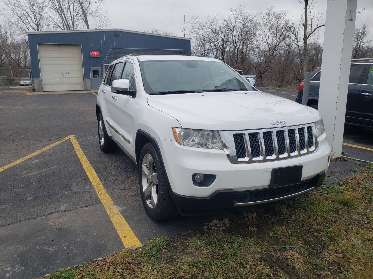 2013 Jeep Grand Cherokee for sale at Platinum Motors in Holland, MI