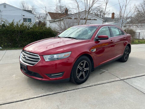 2014 Ford Taurus for sale at Suburban Auto Sales LLC in Madison Heights MI