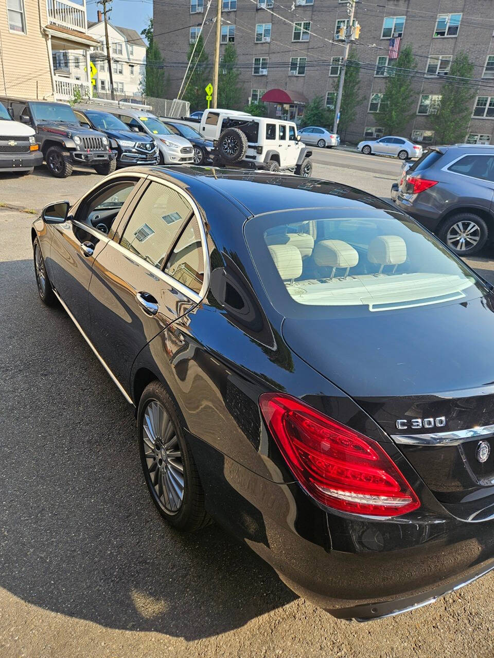 2015 Mercedes-Benz C-Class for sale at RENOS AUTO SALES LLC in Waterbury, CT