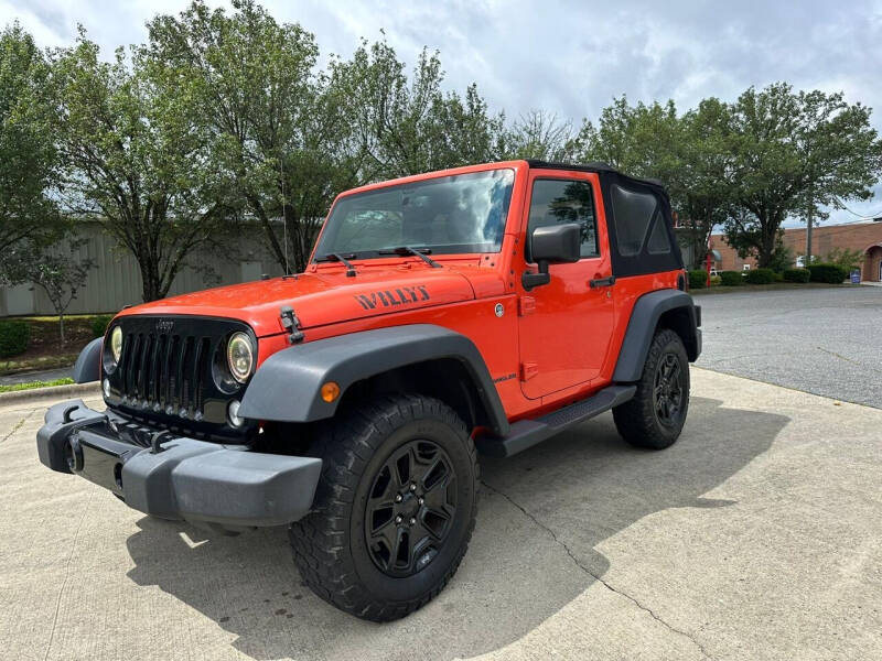 2015 Jeep Wrangler for sale at Triple A's Motors in Greensboro NC