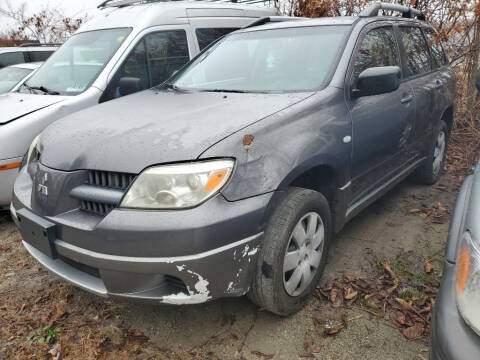 2005 Mitsubishi Outlander for sale at TIM'S AUTO SOURCING LIMITED in Tallmadge OH