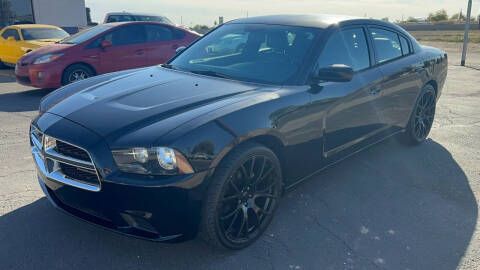 2014 Dodge Charger for sale at 911 AUTO SALES LLC in Glendale AZ