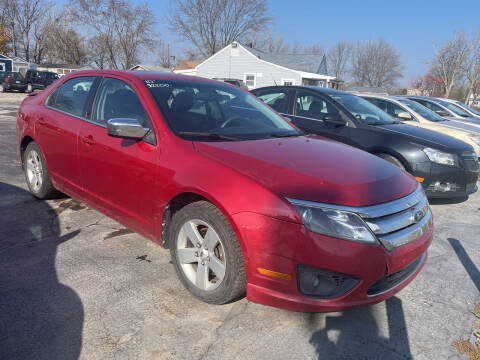2010 Ford Fusion for sale at HEDGES USED CARS in Carleton MI