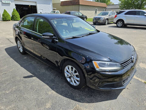 2014 Volkswagen Jetta for sale at Van Kalker Motors in Grand Rapids MI