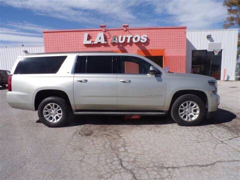 2015 Chevrolet Suburban for sale at L A AUTOS in Omaha NE