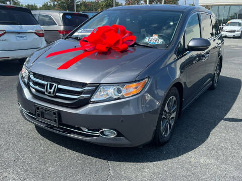 2014 Honda Odyssey for sale at Charlotte Auto Group, Inc in Monroe NC