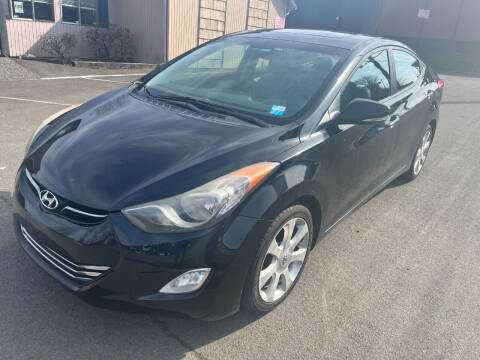 2012 Hyundai Elantra for sale at Wild West Cars & Trucks in Seattle WA