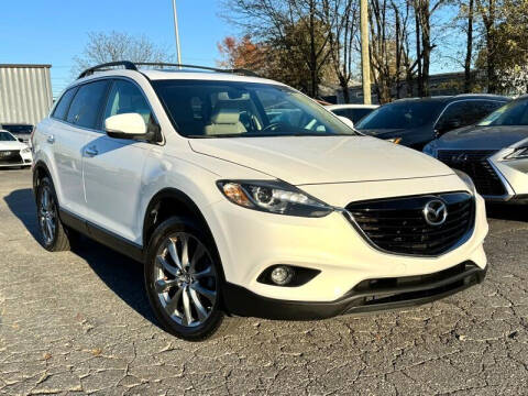 2015 Mazda CX-9 for sale at CU Carfinders in Norcross GA