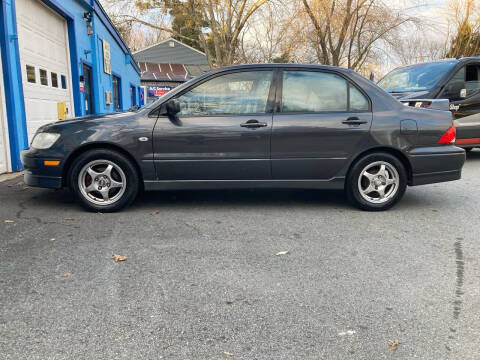 2002 Mitsubishi Lancer for sale at A & D Auto Sales and Service Center in Smithfield RI