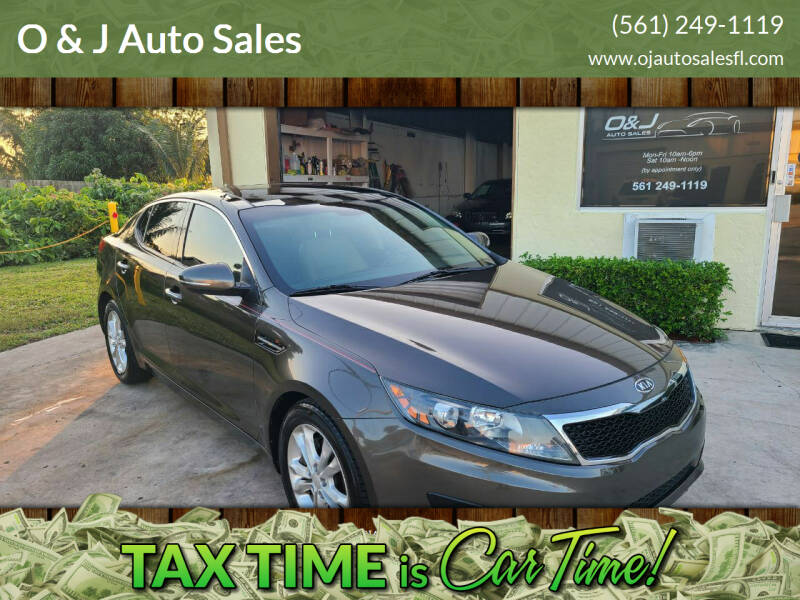 2012 Kia Optima for sale at O & J Auto Sales in Royal Palm Beach FL