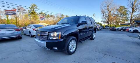 2011 Chevrolet Tahoe for sale at DADA AUTO INC in Monroe NC