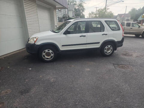 2005 Honda CR-V for sale at Maximum Auto Group II INC in Cortland OH