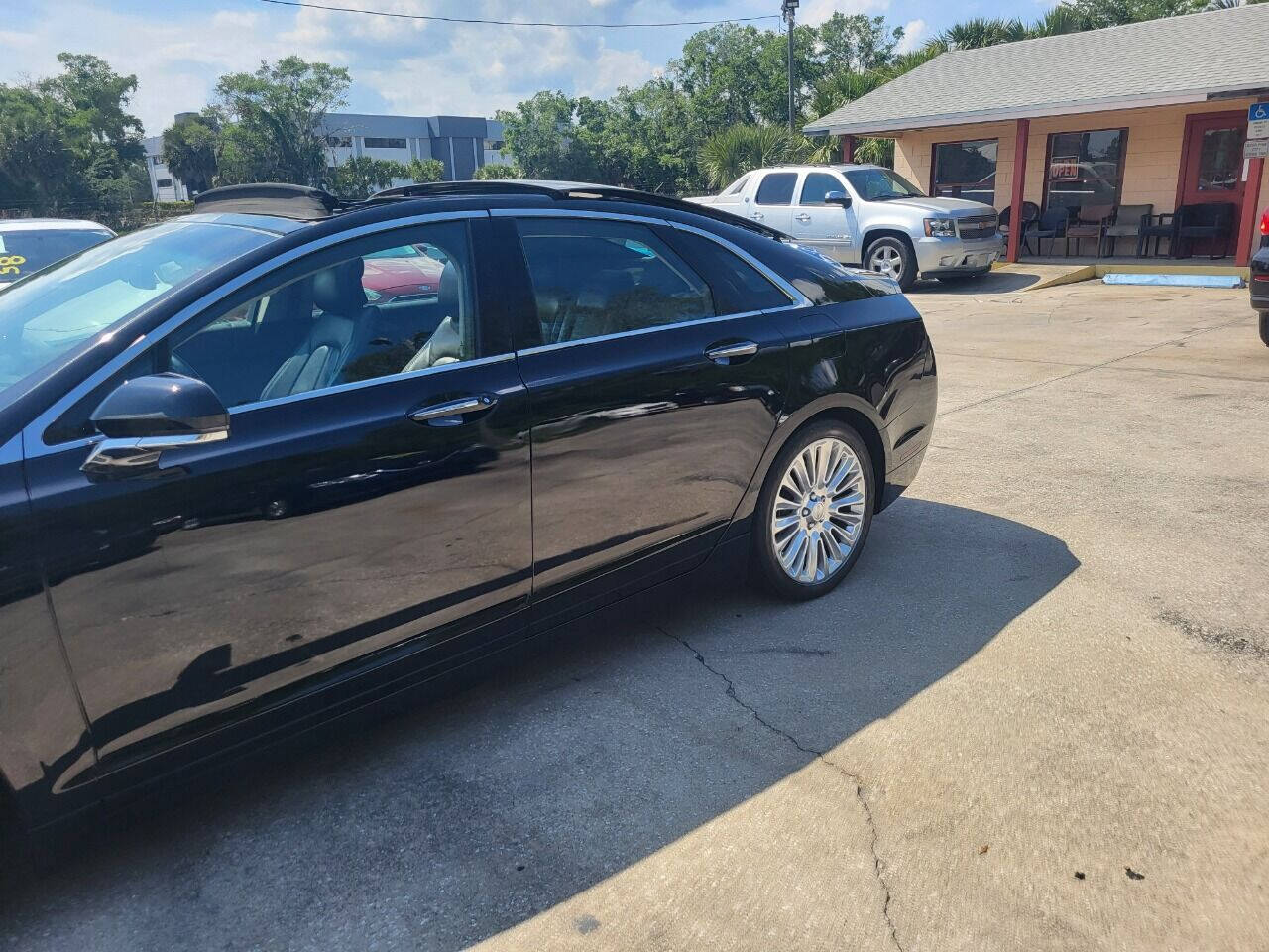 2016 Lincoln MKZ for sale at FAMILY AUTO BROKERS in Longwood, FL