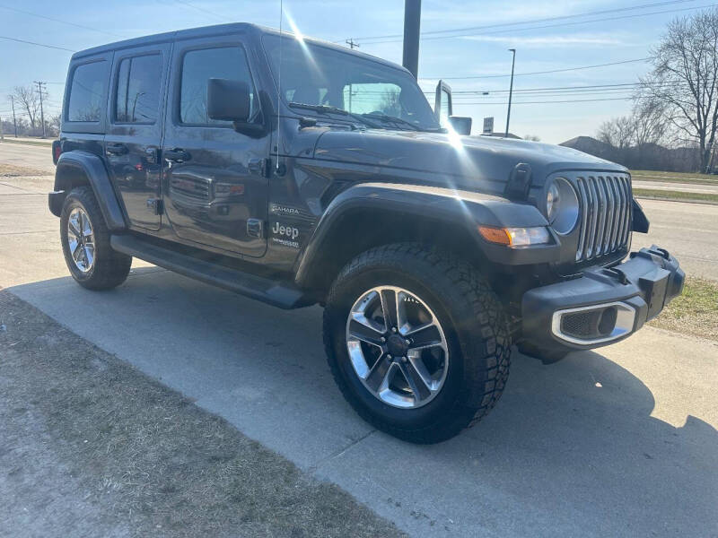Used 2019 Jeep Wrangler Unlimited Sahara with VIN 1C4HJXEN0KW687686 for sale in Oak Creek, WI